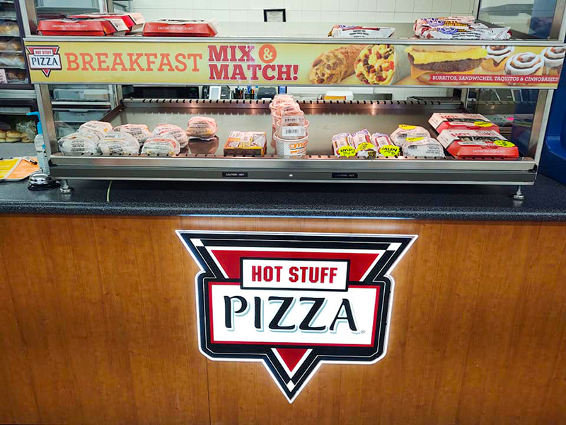 Hot Food section of Timberline Sports-N-Convenience with Hot Stuff Pizza, Breakfast food, Pizza, Cinnobabies and more